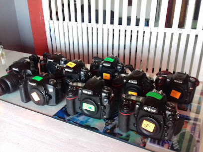 qaizar photo lab studio — optical shop in Sabindo Square, Tawau